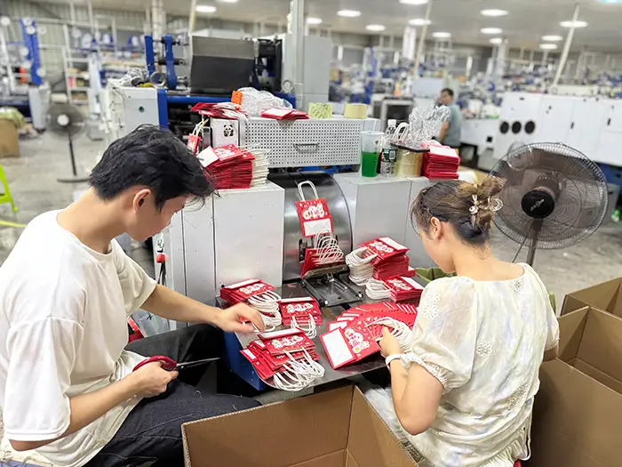 Trabajadores en Fábrica
